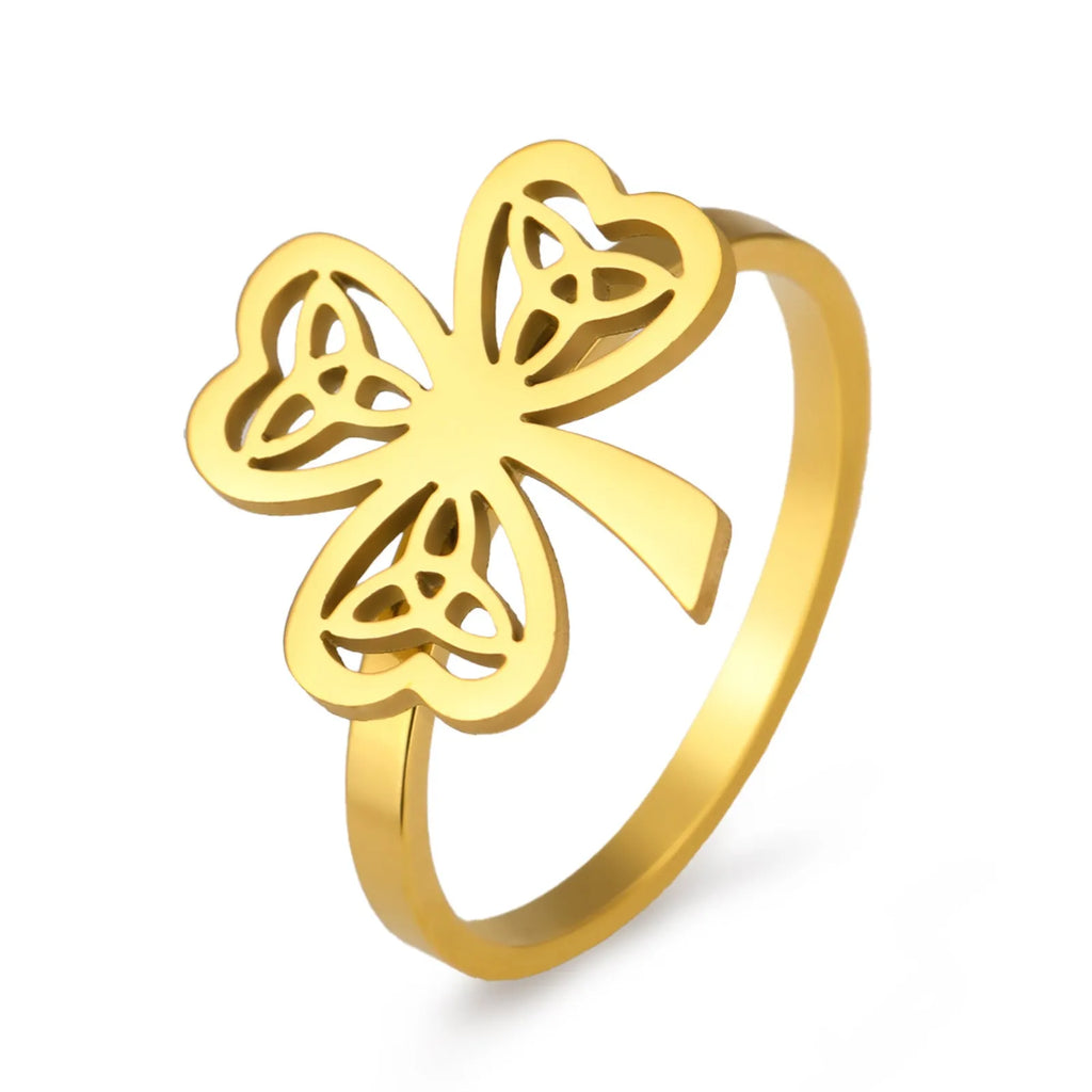 Stainless steel hollow ring with lucky symbol design in gold or steel finish
