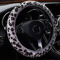 Short plush steering wheel cover in warm material with non-slip backing, 38cm size, colour option shown