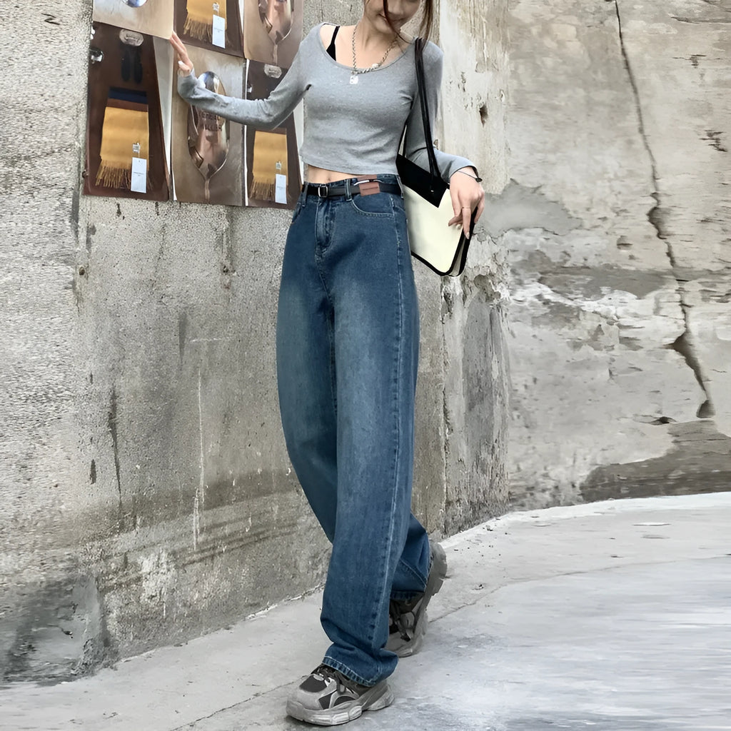 Women's high-waist retro blue straight-leg jeans on a model, showing the cropped, standard, and lengthened leg options.