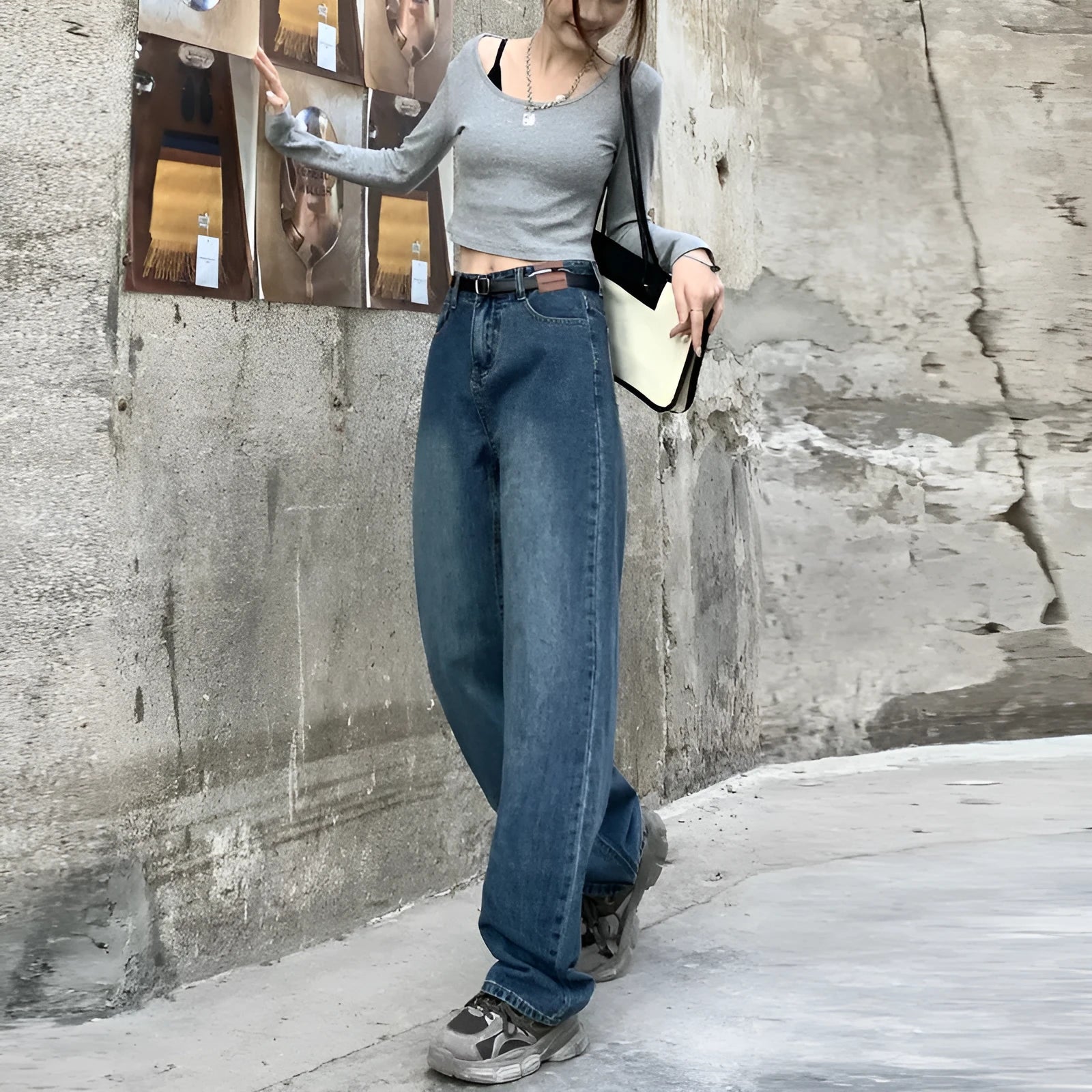 Women's high-waist retro blue straight-leg jeans on a model, showing the cropped, standard, and lengthened leg options.