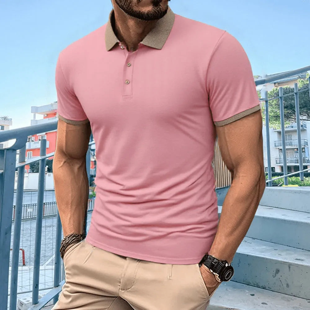 A green ice silk polo shirt with short sleeves and a flocked design on the front, laid flat.