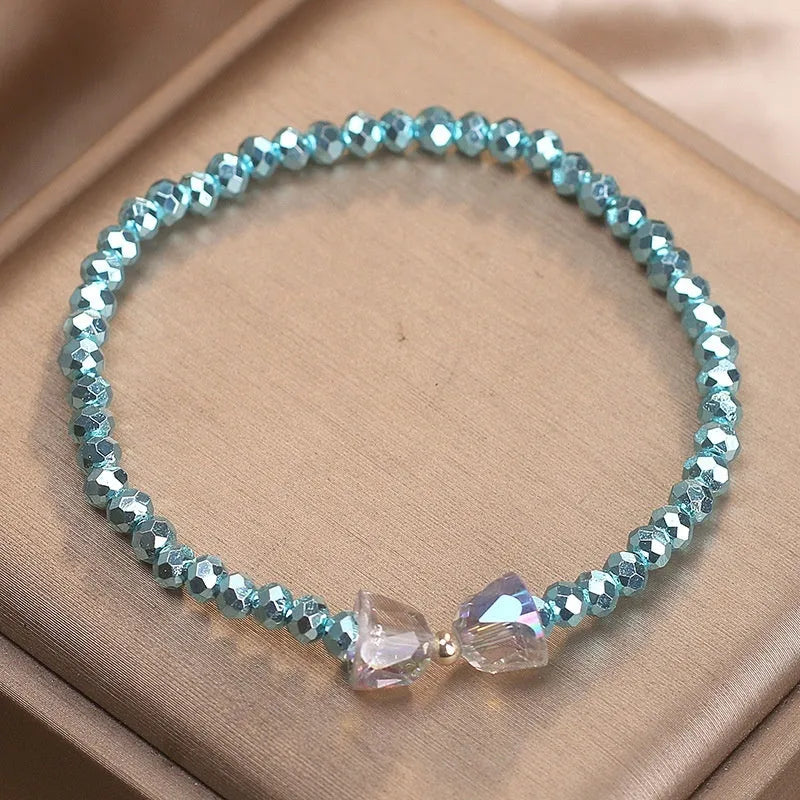 Handmade artificial crystal butterfly bracelet in blue, dark pink, and light pink for women ethnic style