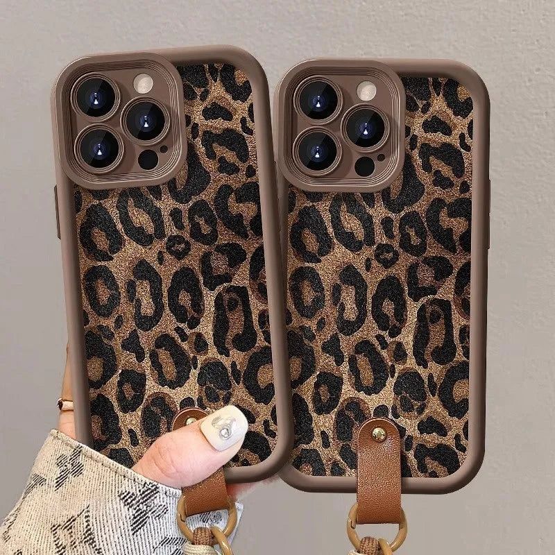 Brown leopard print silicone phone case with a detachable lanyard for an iPhone.