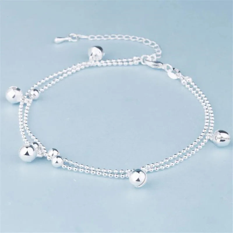 Silver plated bell anklet with geometric design, 16cm chain plus 3cm extension, copper base
