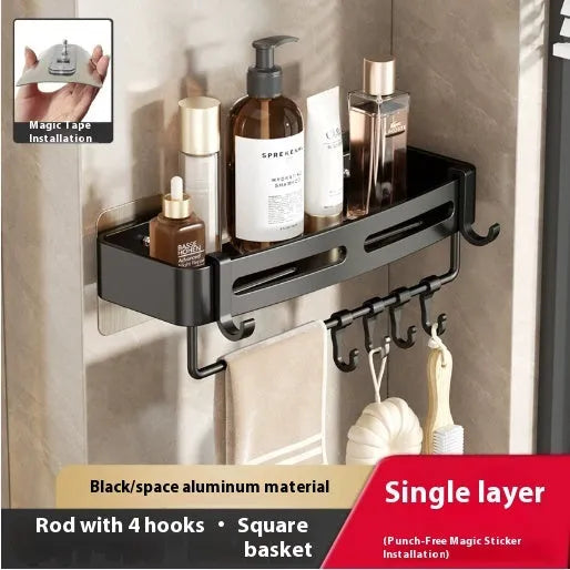 Gun grey triangle bathroom storage rack mounted in corner with towels and toiletries