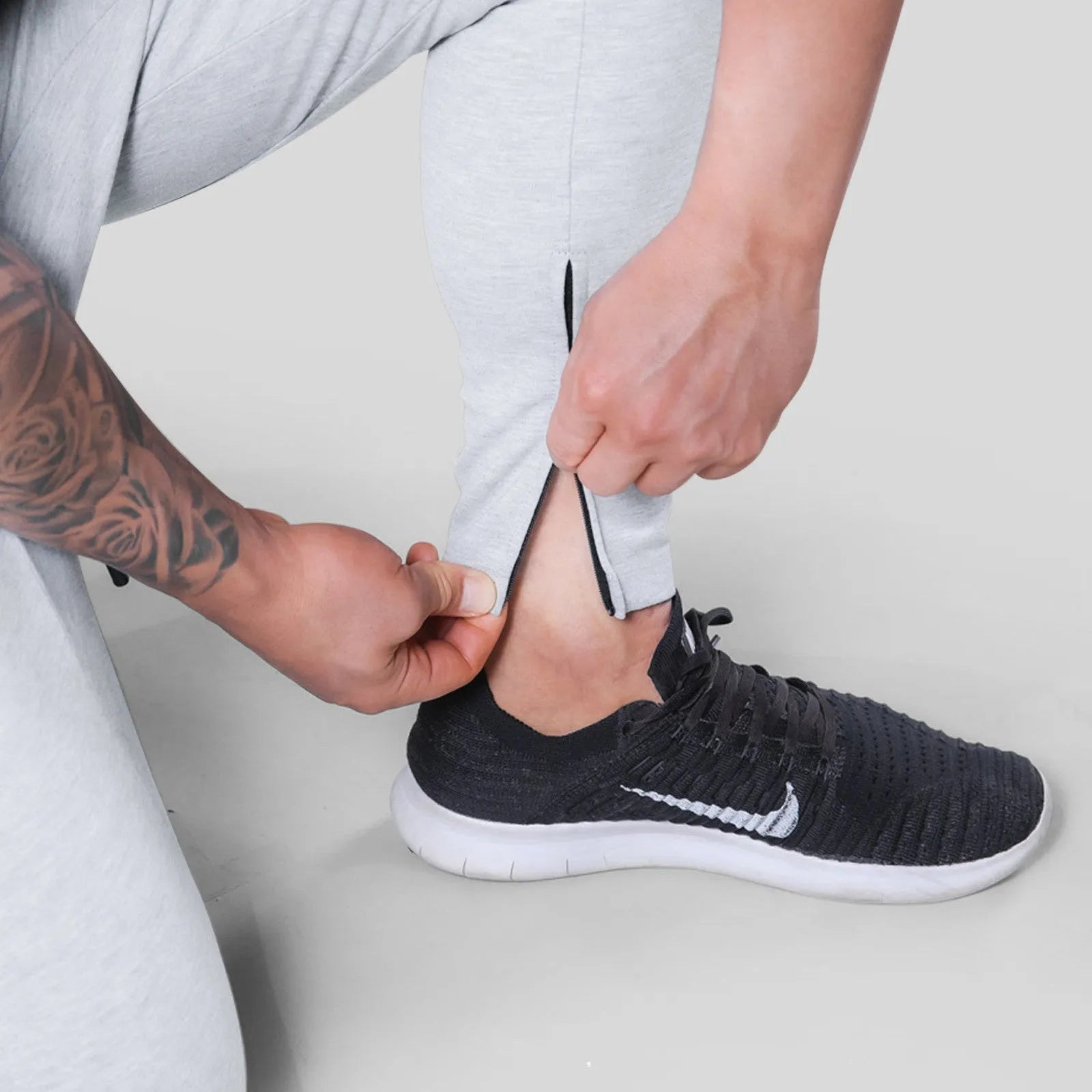 Men's polyester fitness pants for gym leisure, available in multiple colours and sizes M to XXXL
