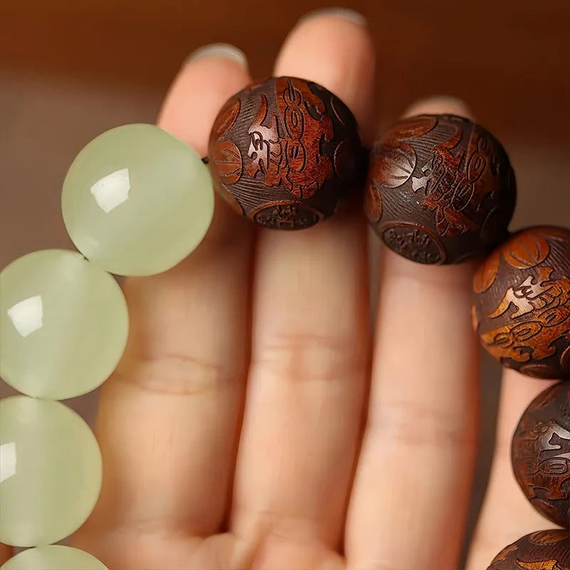 Rosewood flexible bracelet with carved Fu characters on 12 wooden pieces