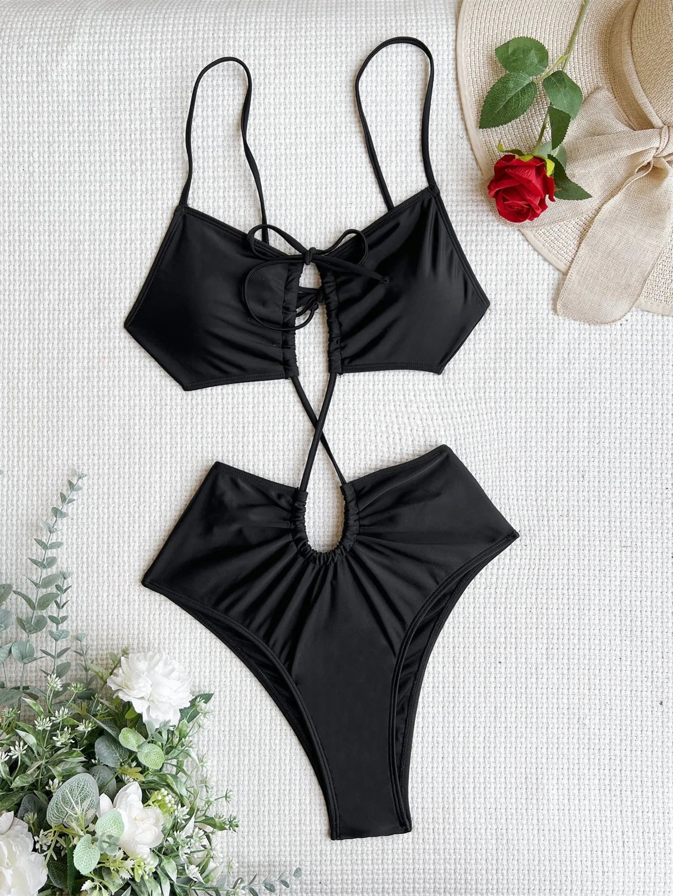 Women's sleeveless one-piece swimsuit with hollow cut-out design in green, red, or black.