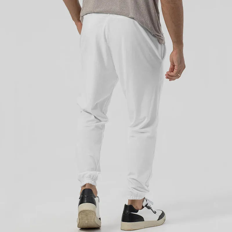 Men's gray loose-fit straight-leg track sweatpants with a mid waist