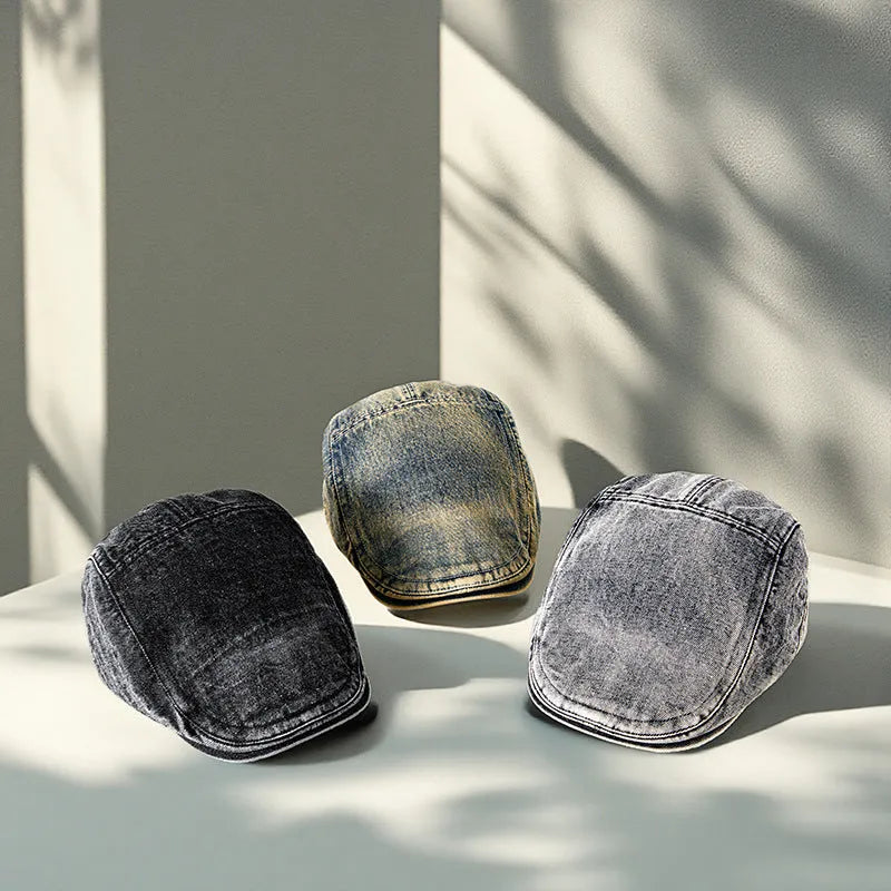 Men's flat top denim cap in wash-treated cotton fabric on a neutral background.