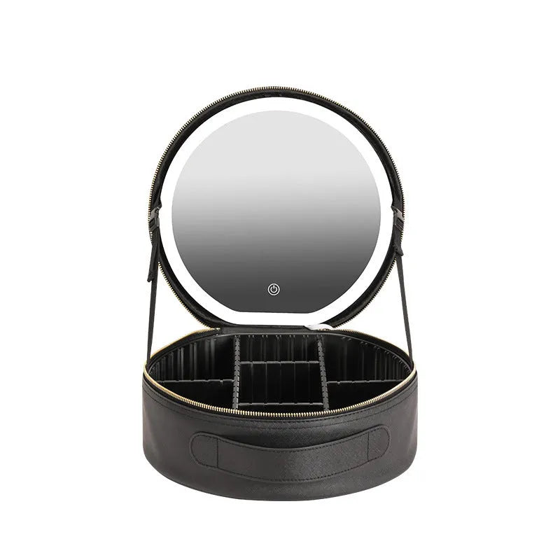 Round pink PU leather makeup bag with built-in LED illuminated mirror and internal cosmetic partitions open.