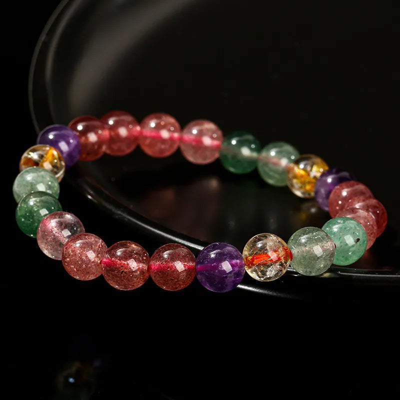 Women's strawberry quartz bracelet with tourmaline colour in round 7mm, 8mm, and 9mm bead sizes.