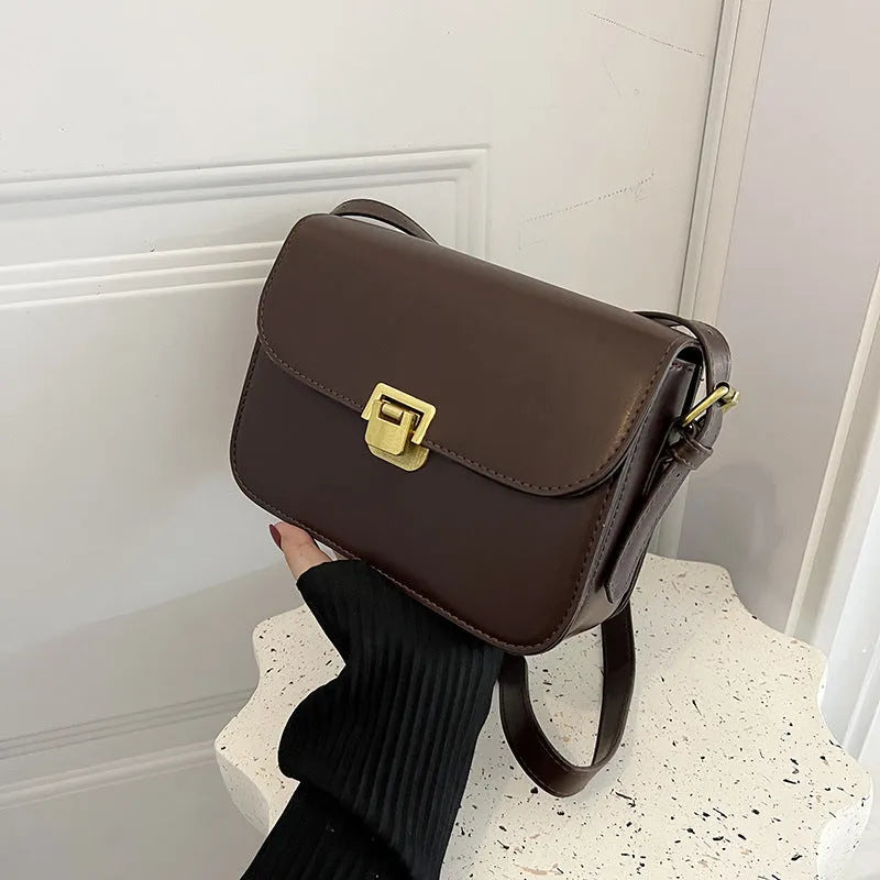 Women's soft PU leather cross-body bag in horizontal square shape showing texture detail and colour options