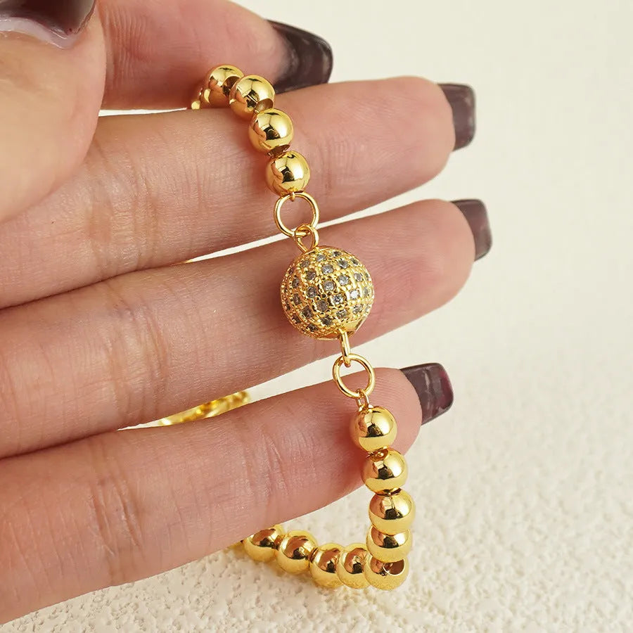Arabic style heart-shaped copper bracelet for women with a round zircon stone centrepiece.