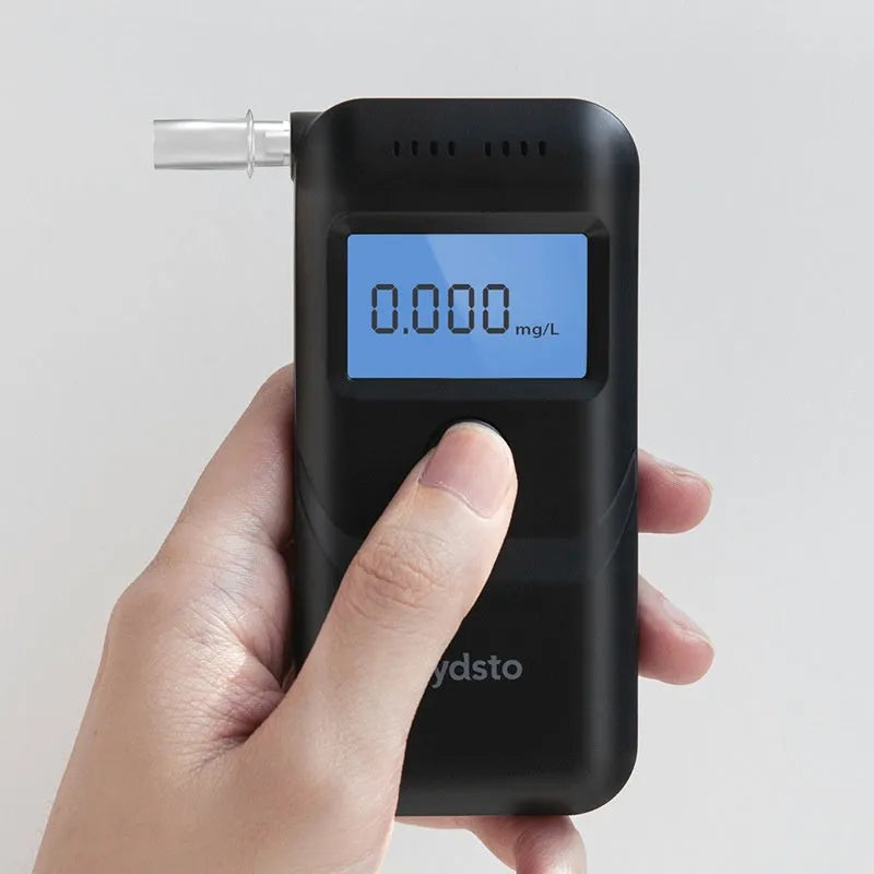 Black household alcohol breath tester device for personal intoxication checking