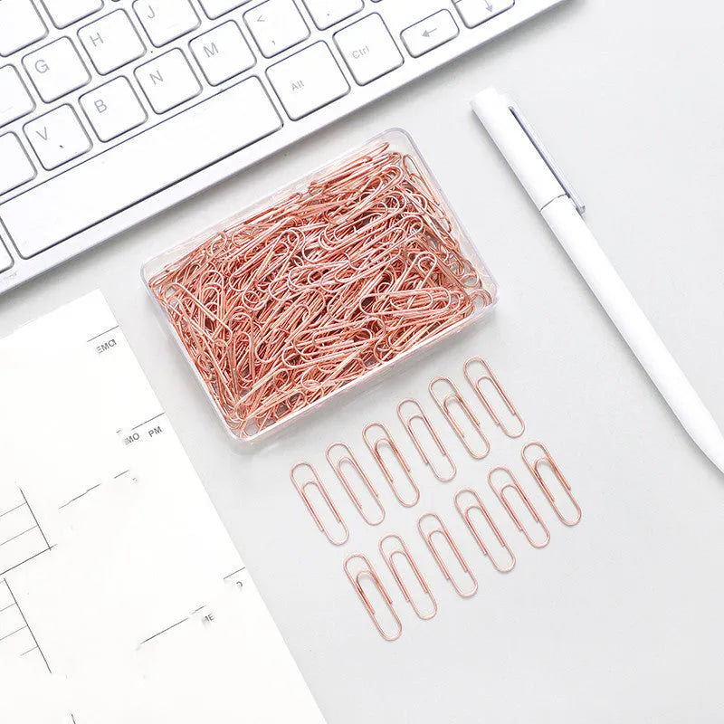 Rose gold heart-shaped paper clips with steel core construction, 28mm size