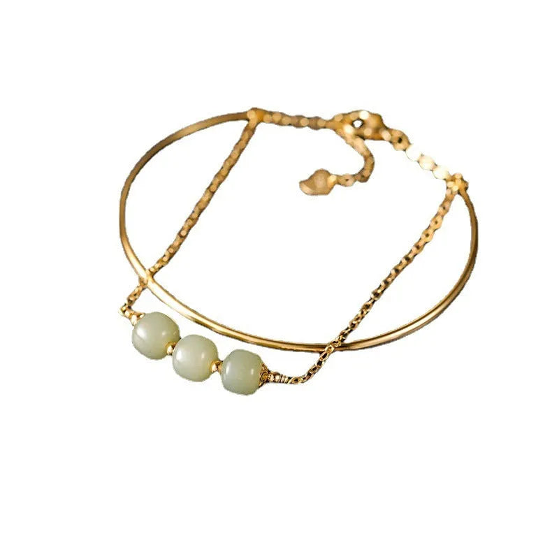 Women's jade lucky beads bracelet with gold inlay treatment showing single, double, and three beads versions