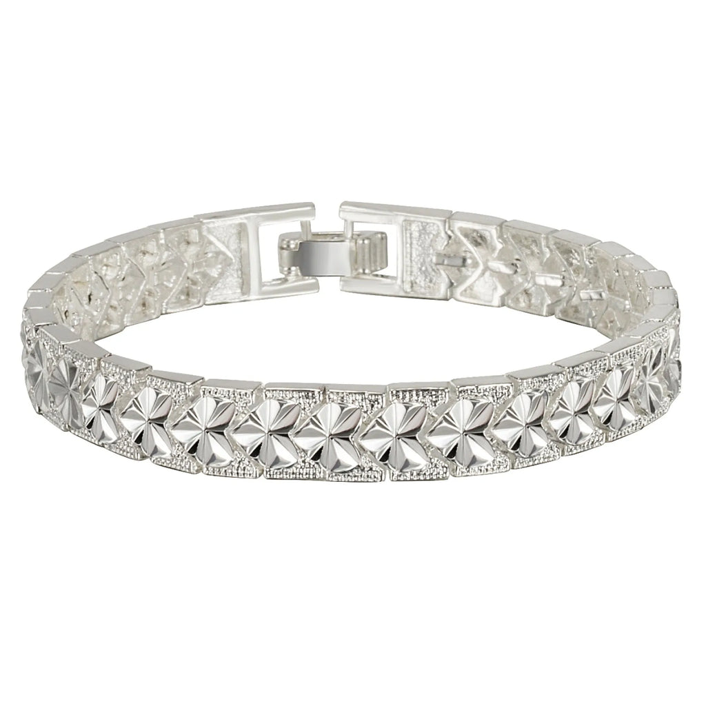 Silver electroplated copper bracelet for women with peach-shaped heart buckle closure on white background
