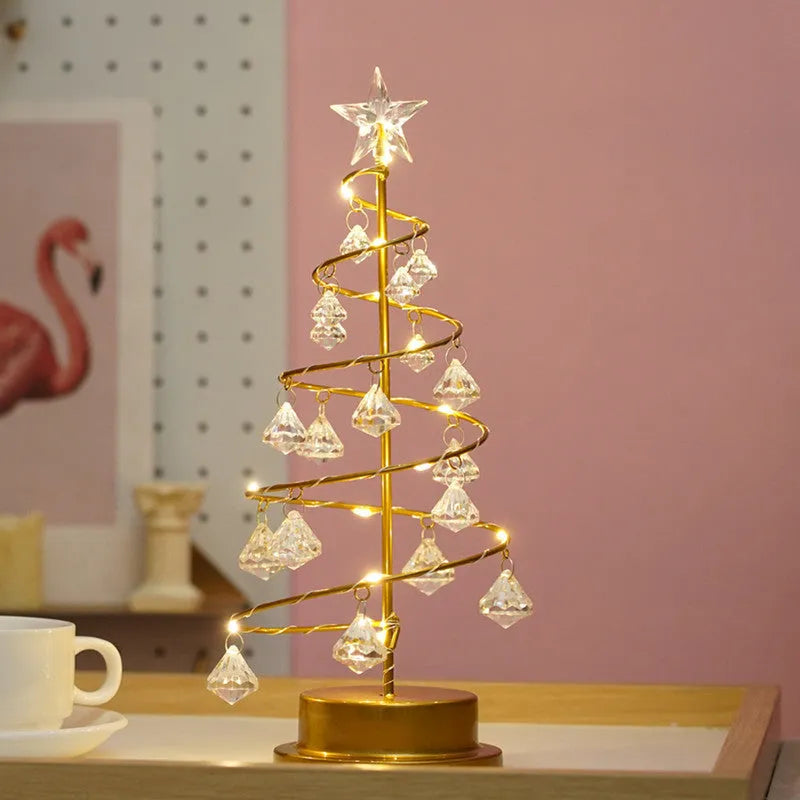Gold crystal Christmas tree LED light with warm glow, star topper, 33cm tall, on a tabletop