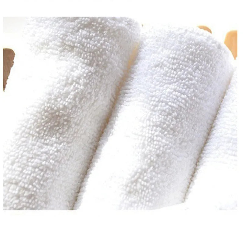 White microfiber washable diaper absorbent pad 33x13cm on plain background