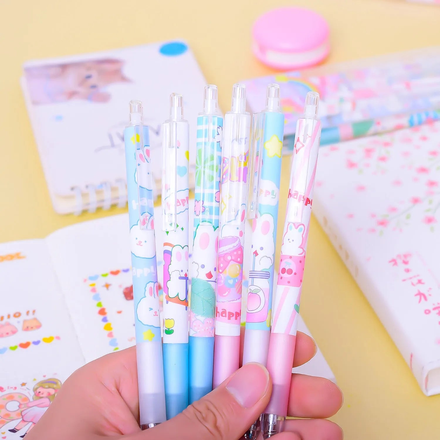 Six Cartoon Bunny Student Stationery Writing Pens with 0.5mm black ink tips in plastic shells