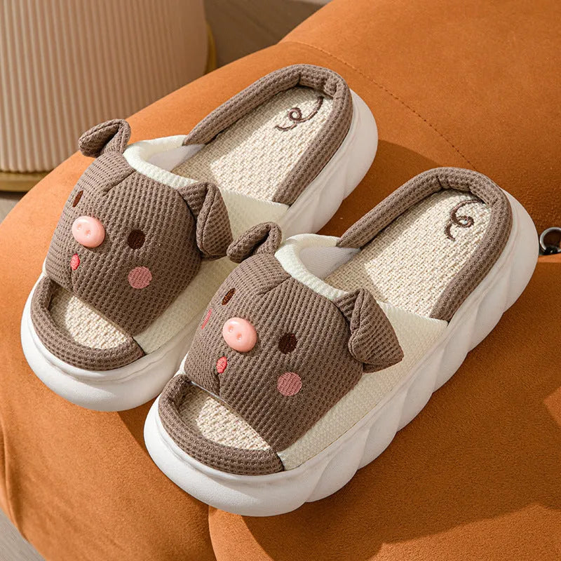 Piggy cute couple open toe linen slippers in pink colour on a white background.