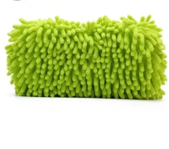 Silver green microfiber car wash sponge measuring 14x25cm on a car surface.