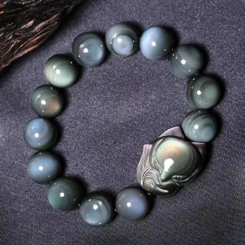 Obsidian carved fox couple bracelet showing animal zodiac design in cartoon style