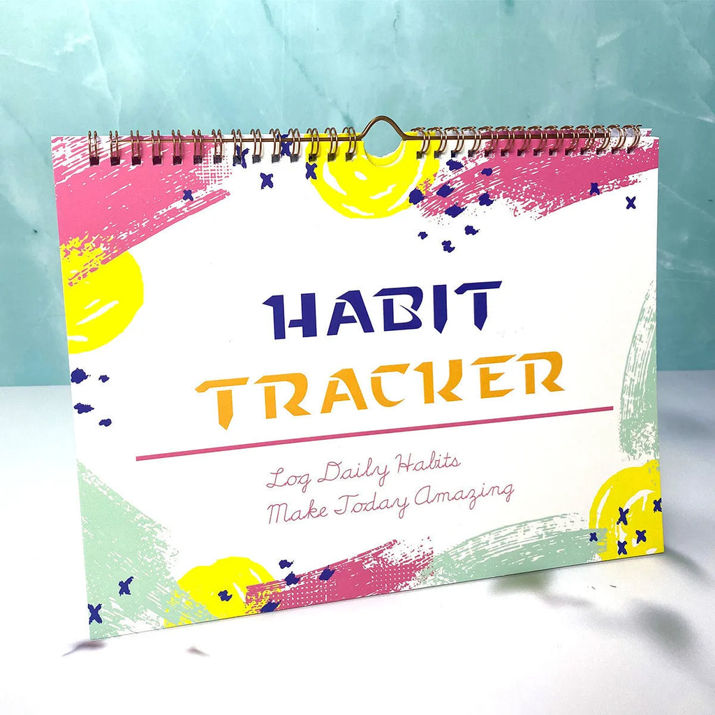 English habit tracking notebook open showing 12 internal pages with A4 21x28cm dimensions