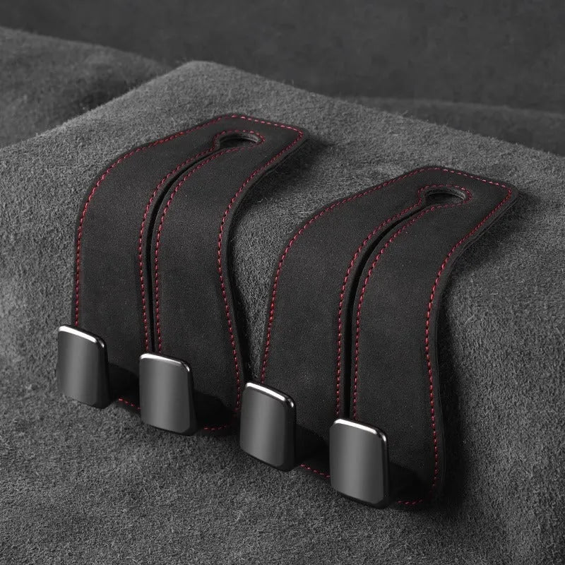 Alloy car seat hook with cartoon style design in black, brown, or grey colour options
