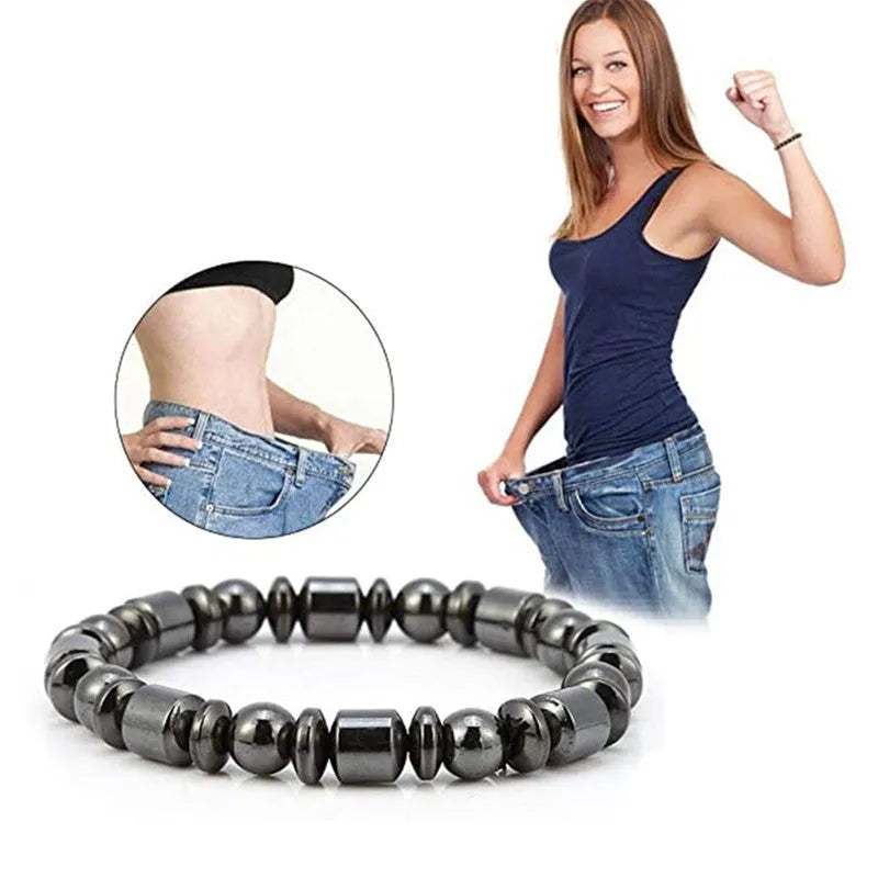 Black stretch bracelet with pentagram stone design, made from magnetite and hematite.