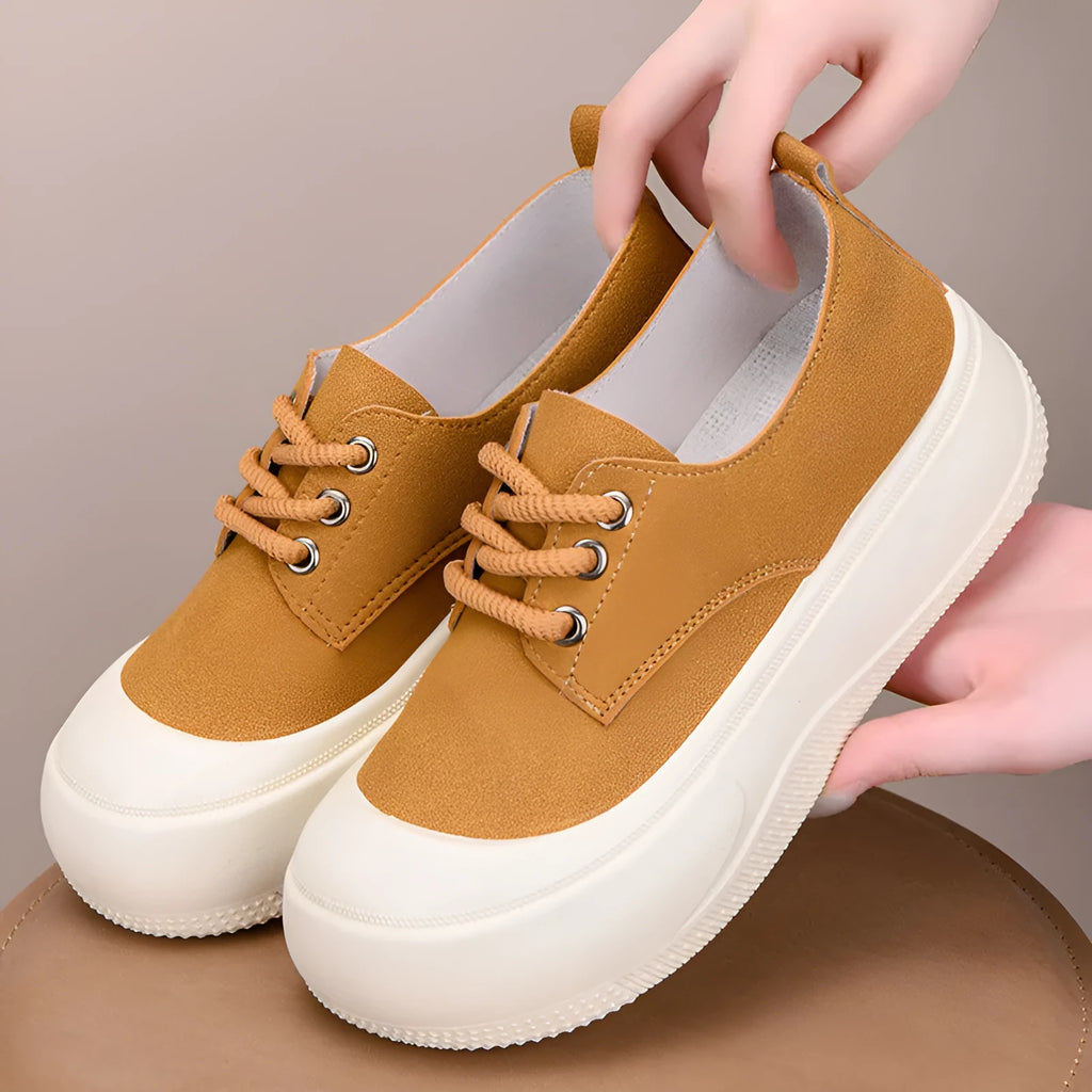 Women's camel suede platform loafers with round toe and front lace-up closure on flat rubber sole