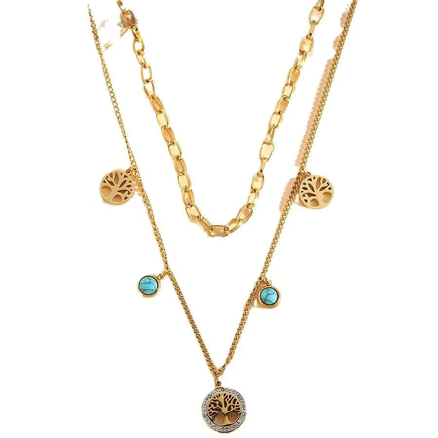 Gold titanium steel multi-layer box chain necklace with turquoise accent on model