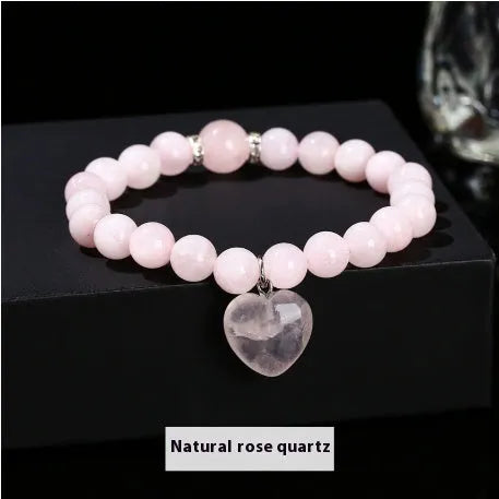 Handmade women's bracelet with geometric pendant and round natural crystal beads.