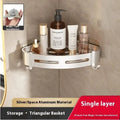 Gun grey triangle bathroom storage rack mounted in corner with towels and toiletries
