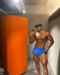 Men's stretch cotton fitness shorts in black with elasticated waist, side view