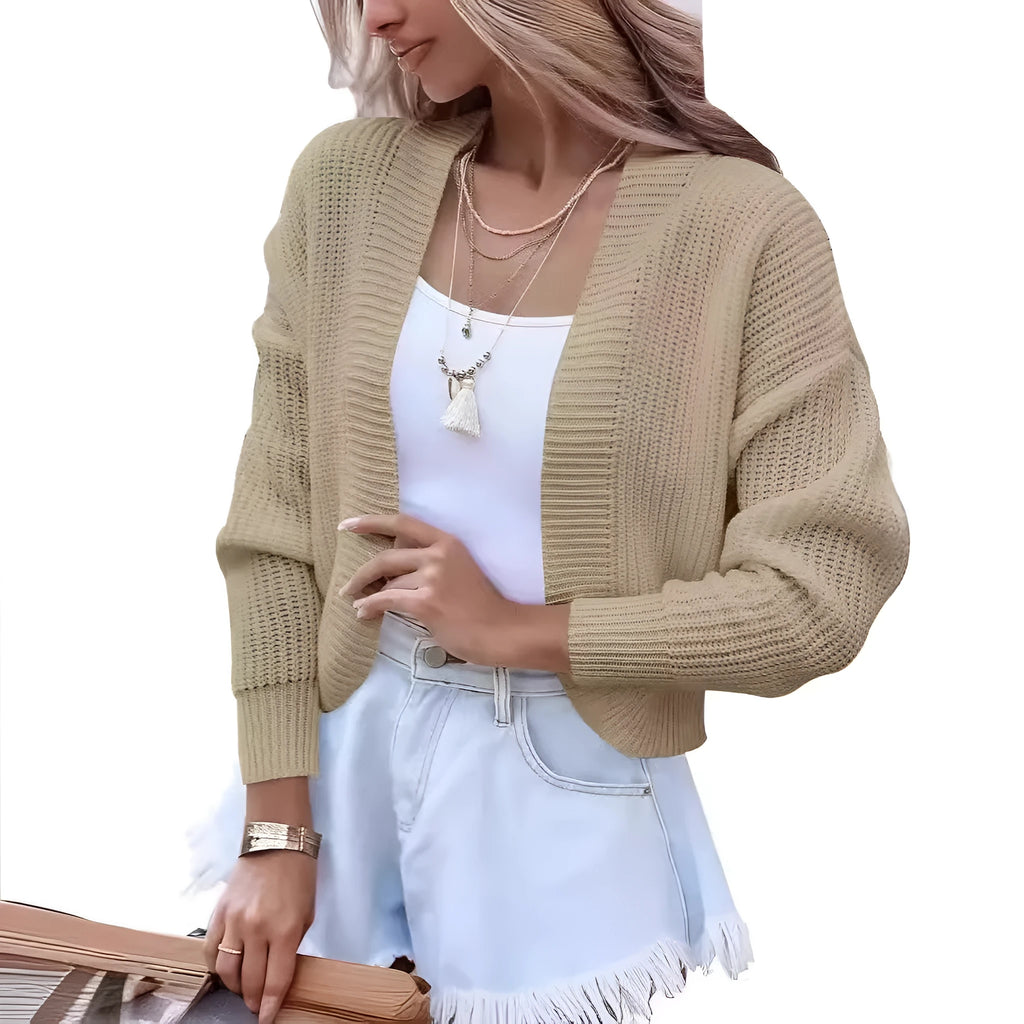 Women's short cape knitted cardigan sweater in solid colour, long sleeves, open front, polyester knit fabric.
