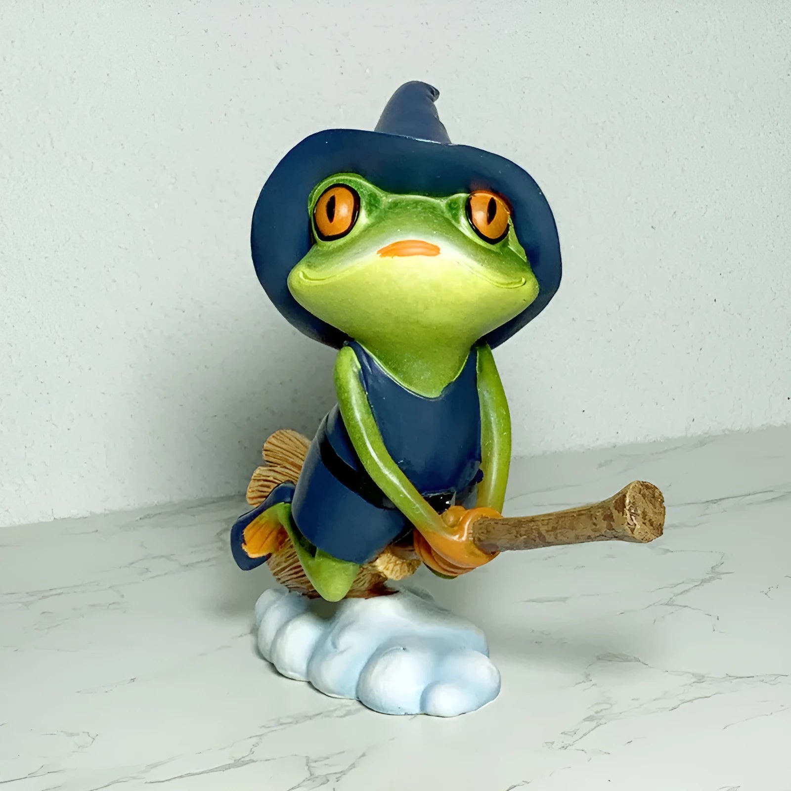 European style Magic Yoga Frog ornament in RDW123 colour on a shelf.