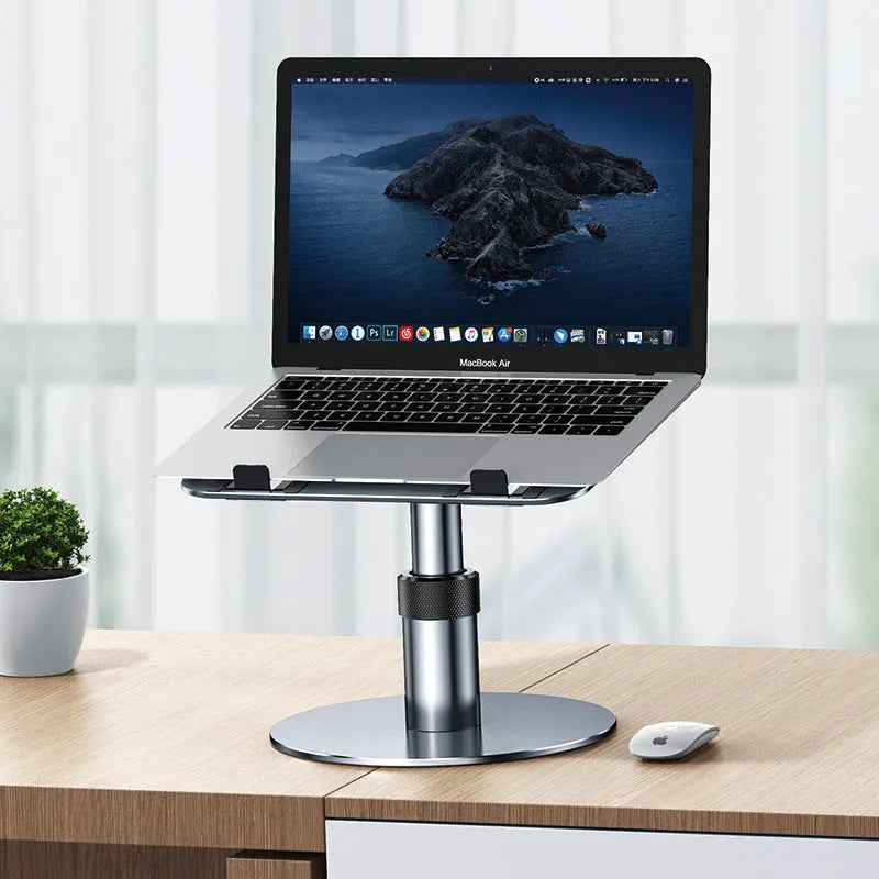 Silver aluminium laptop stand at adjustable height with rotating base and non-slip pads