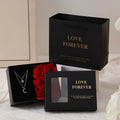 Red Korean-style gift box open to show six pink soap flowers, with a matching handbag beside it.