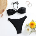 Black women's bikini set with lace-up tube top and briefs on a white background.