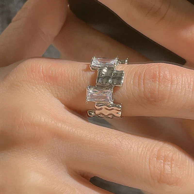 Geometric silver zircon ring with open design and three-dimensional retro decorations