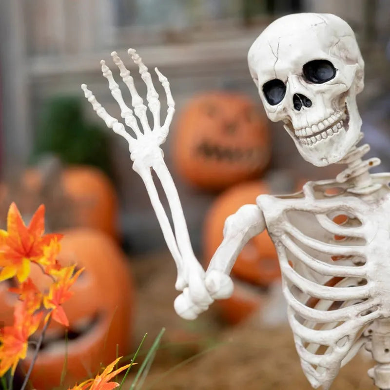 90cm tall white plastic Halloween skeleton with movable joints posed standing.