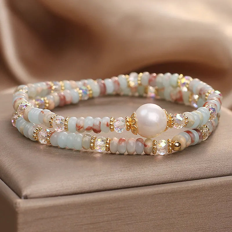 Natural colour Shoushan stone double circle bracelet with crystal one pearl on white background