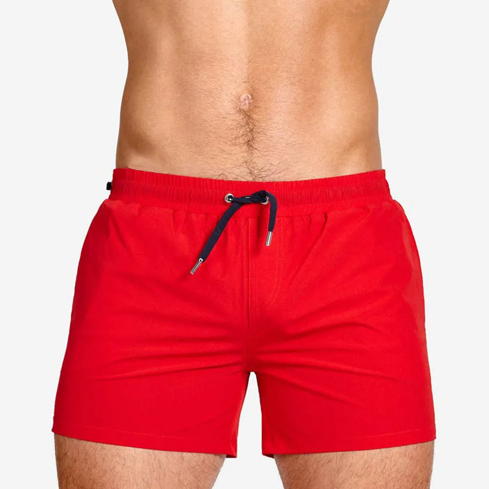 Men's mesh lining sports shorts in polyester available in multiple colours