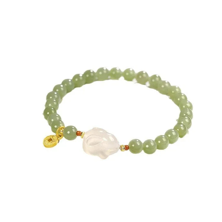 Hetian jade rabbit bracelet for women with animal zodiac design and glass construction