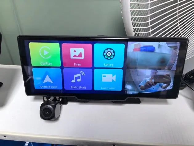 Black 10.26-inch car navigation device with suction mount showing split screen display of map and camera footage