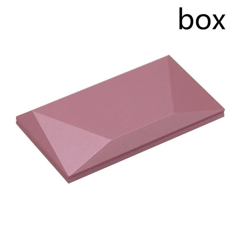 Red plastic heart-shaped rotating ring box with rose decoration inside white storage case