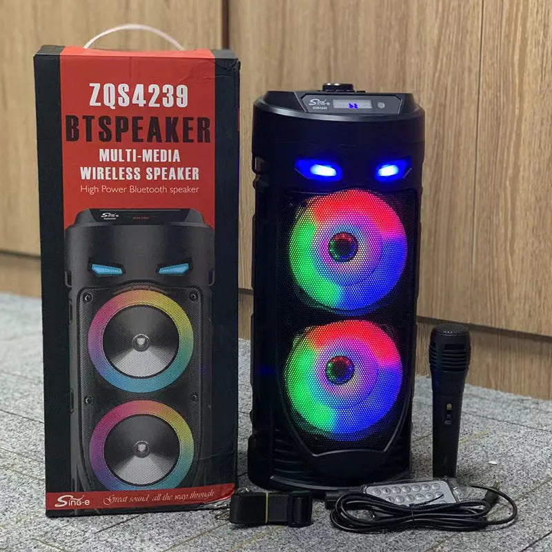 Black portable Bluetooth speaker with dual horn cannon design and USB charging port