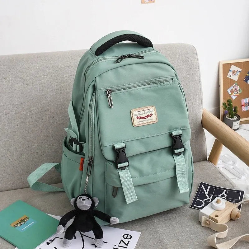 PVC student backpack with three-dimensional pocket, lace detail, available in six colours